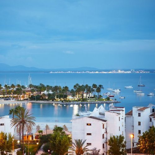 View of the bay of Port de Alcudia at sunrise in the north of Mallorca.