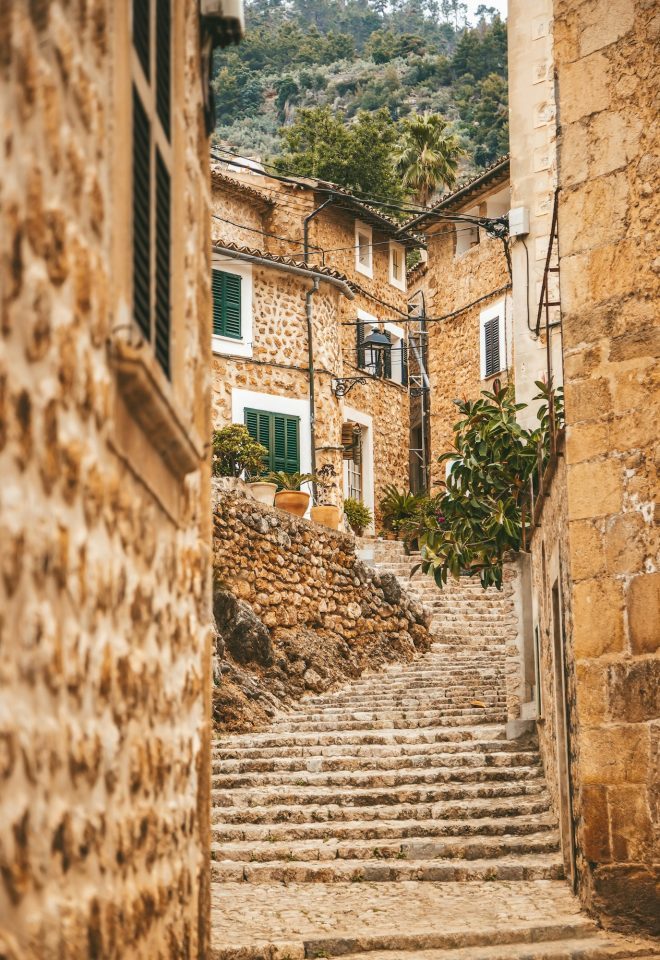 A charming old staircase in the cozy street in Galilea on Mallorca