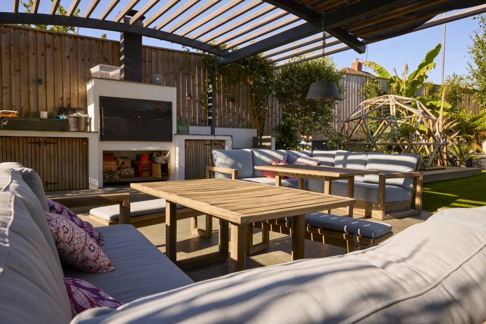 Cala Santanyi property in Mallorca with outdoor seating area and garden of a modern house