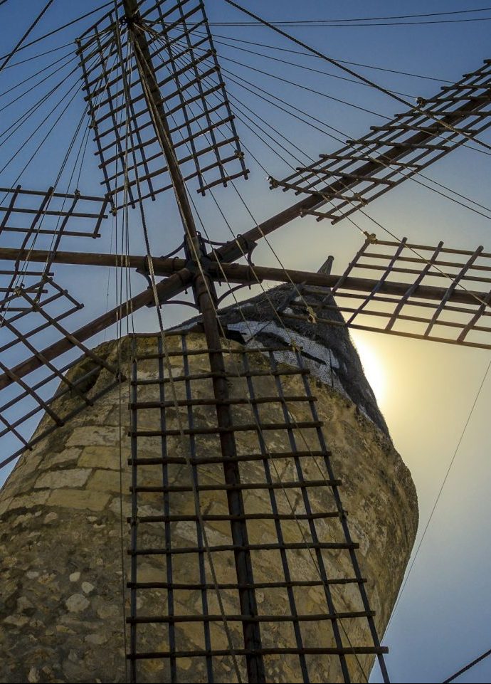 Spain, Mallorca, S'Illot, wind mill against the sun