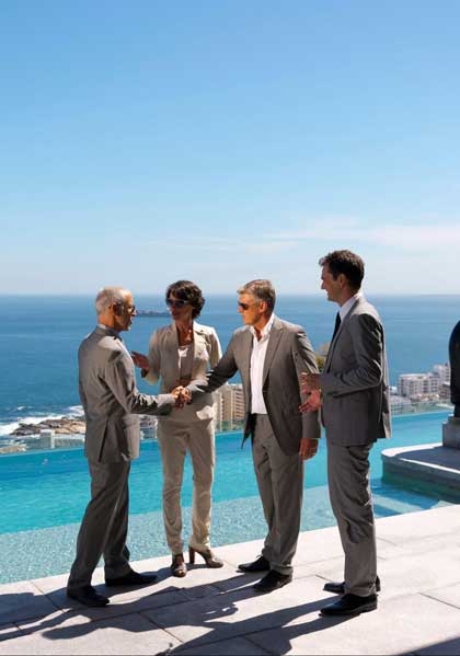 Real estate agent with client at the conclusion of a real estate purchase