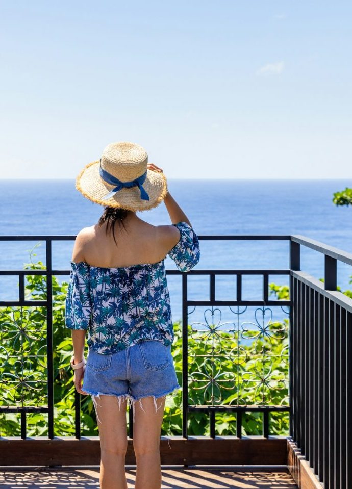 Woman on the terrace of a house in 1st sea line Mallorca