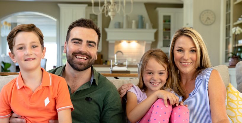 Family at home in the living room